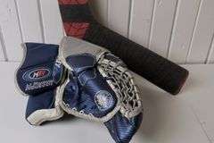 HOCKEY GOALIE STICK AND GLOVE