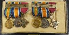 TWO SETS OF WW1 SERVICE MEDALS
