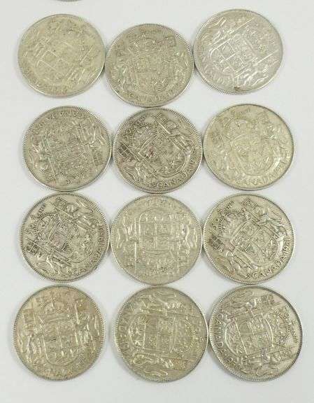 19 CANADIAN SILVER 50-CENT COINS