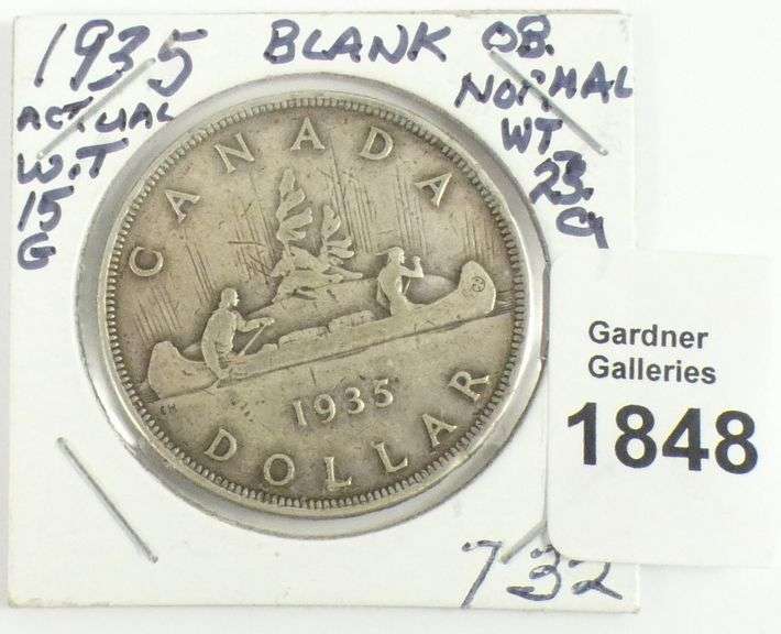 CANADIAN SILVER DOLLAR ERROR COIN