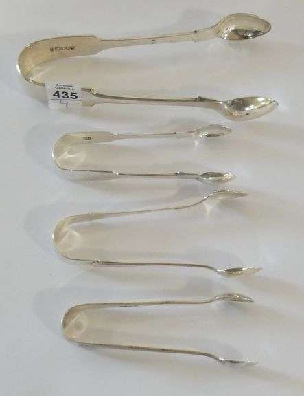 FOUR STERLING SUGAR TONGS