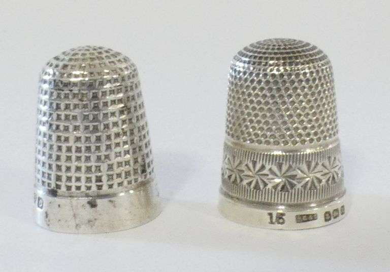 TWO STERLING THIMBLES