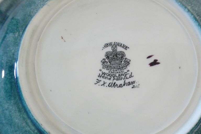 TWO ENGLISH ART POTTERY PLATES