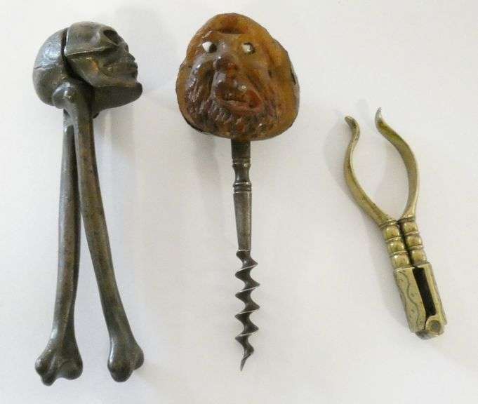TWO NUTCRACKERS AND CORKSCREW