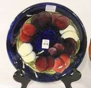 TWO ENGLISH ART POTTERY PLATES