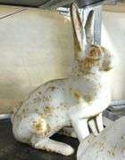 PAIR OF CAST IRON RABBITS