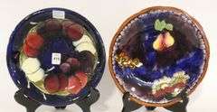 TWO ENGLISH ART POTTERY PLATES