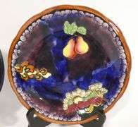 TWO ENGLISH ART POTTERY PLATES