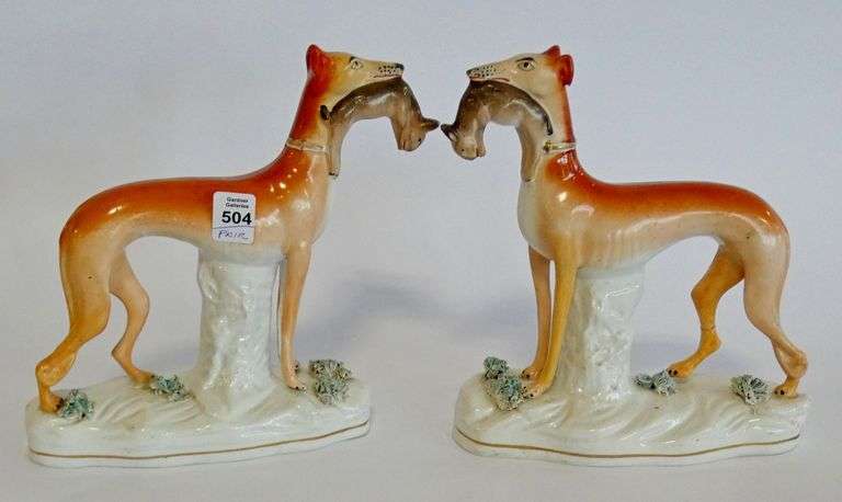 PAIR OF ANTIQUE STAFFORDSHIRE "WHIPPET" FIGURINES
