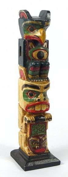 CARVED TOTEM POLE