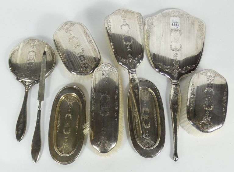 EXTENSIVE STERLING TOILETTE SET