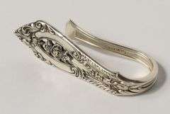 SET OF EIGHT WALLACE "ROSE POINT" STERLING NAPKIN RINGS