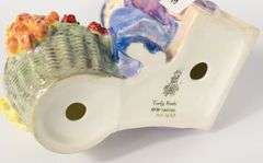 ROYAL DOULTON "CURLY KNOB" FIGURINE