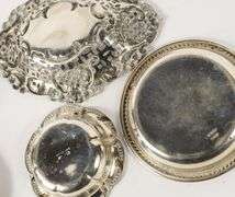 FIVE STERLING SILVER SMALL DISHES