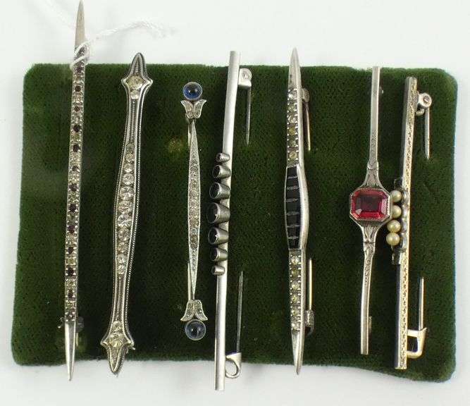 7 ANTIQUE BAR PINS