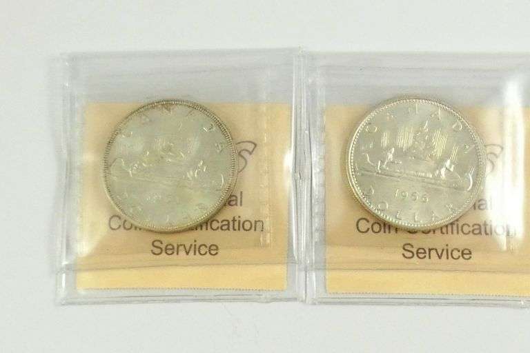 2 GRADED CANADIAN SILVER DOLLARS