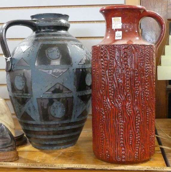TWO MCM POTTERY EWERS
