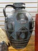 TWO MCM POTTERY EWERS