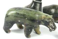 FOUR INUIT CARVINGS