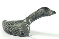 THREE INUIT STONE CARVINGS INCLUDING SYOLLIE AWP