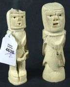 TWO INUIT TUPILAK CARVED FIGURES