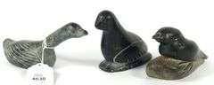 THREE INUIT STONE CARVINGS INCLUDING SYOLLIE AWP