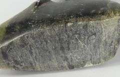 FOUR INUIT CARVINGS