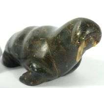 FOUR INUIT CARVINGS