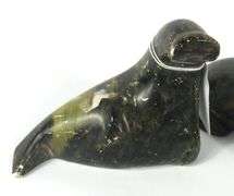 FOUR INUIT CARVINGS