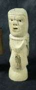 TWO INUIT TUPILAK CARVED FIGURES