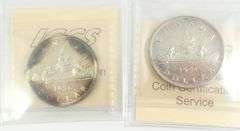 2 GRADED CANADIAN SILVER DOLLARS