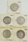 9 CANADIAN SILVER 50-CENT COINS