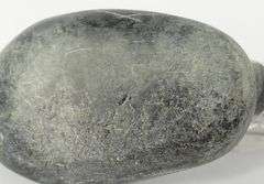 THREE INUIT STONE CARVINGS INCLUDING SYOLLIE AWP