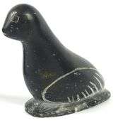 THREE INUIT STONE CARVINGS INCLUDING SYOLLIE AWP