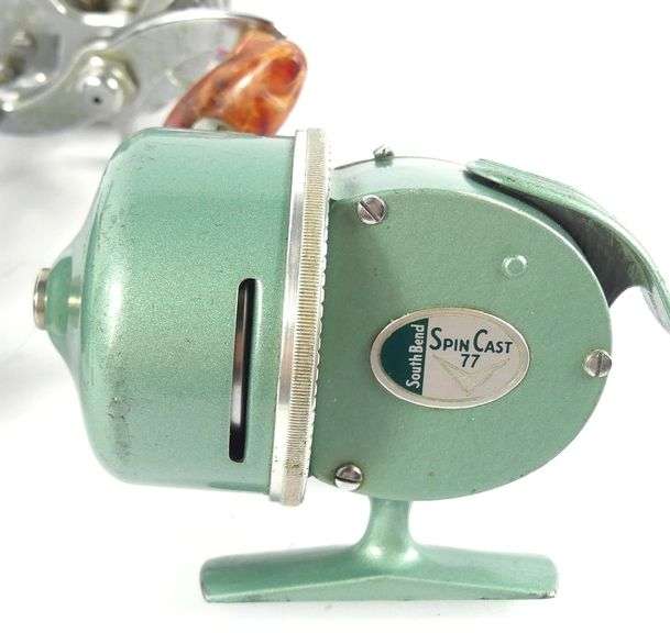 THREE FISHING REELS