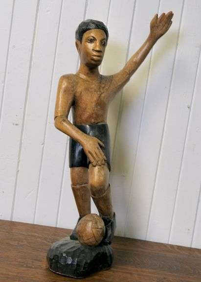 CARVED WOOD FOOTBALLER