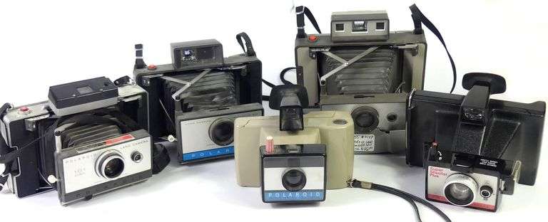 POLAROID CAMERAS, ETC.