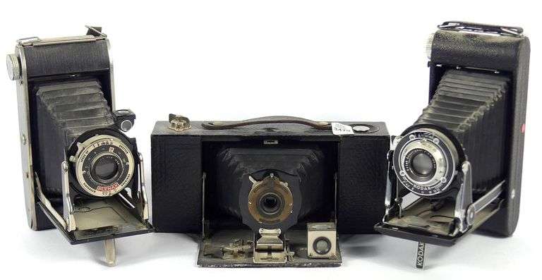 THREE ANTIQUE FOLDING CAMERAS