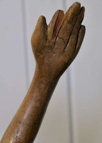 CARVED WOOD FOOTBALLER