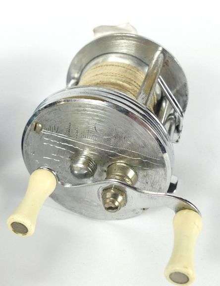 FOUR VINTAGE REELS