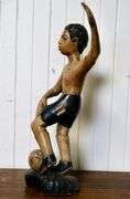 CARVED WOOD FOOTBALLER
