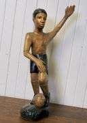 CARVED WOOD FOOTBALLER