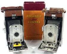 TWO POLAROID LAND CAMERAS