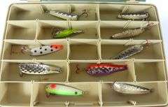 TACKLE BOX WITH SPOON-STYLE FISHING LURES