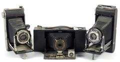 THREE ANTIQUE FOLDING CAMERAS