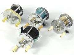 FOUR VINTAGE REELS