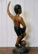 CARVED WOOD FOOTBALLER