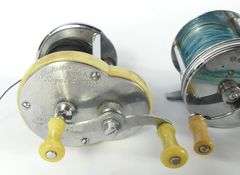 FOUR VINTAGE REELS