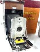 TWO POLAROID LAND CAMERAS