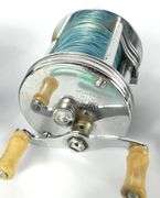 FOUR VINTAGE REELS